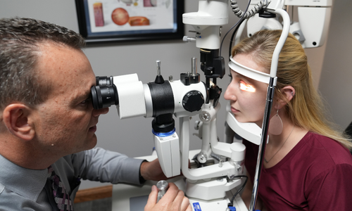 Dr. Hockemeyer performing an eye exam